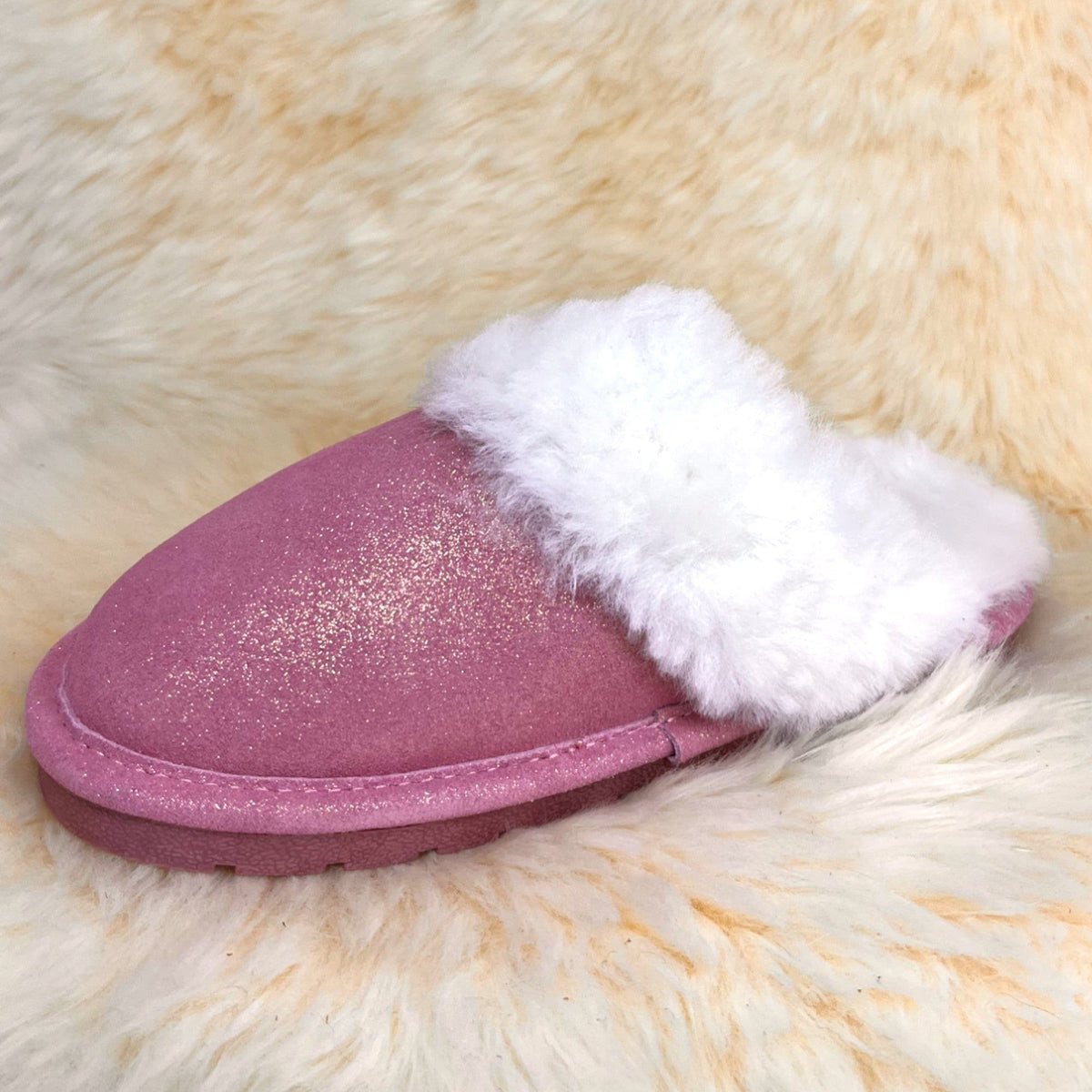 Rose gold shimmer sheepskin scuff slipper, low side angle