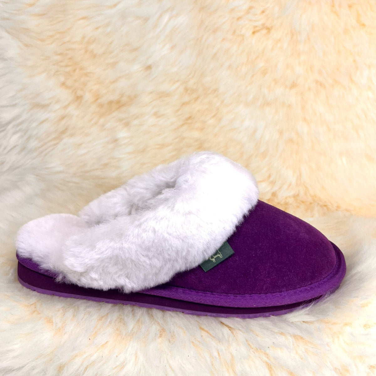 Women's purple sheepskin scuff slipper, side view