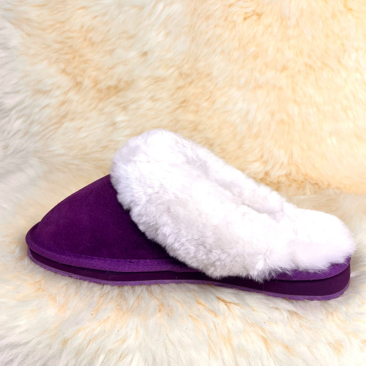 Women's purple sheepskin scuff slipper, inner side view