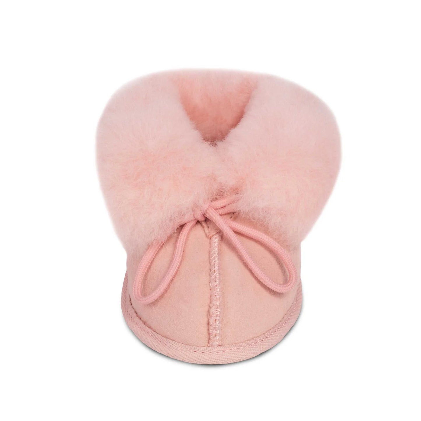 Pink sheepskin baby bootie with fleece cuff and lace tie, front
