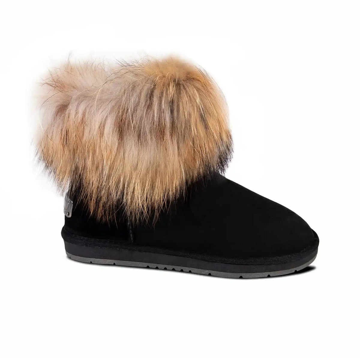 Black boot with a fur pom-pom on a white background