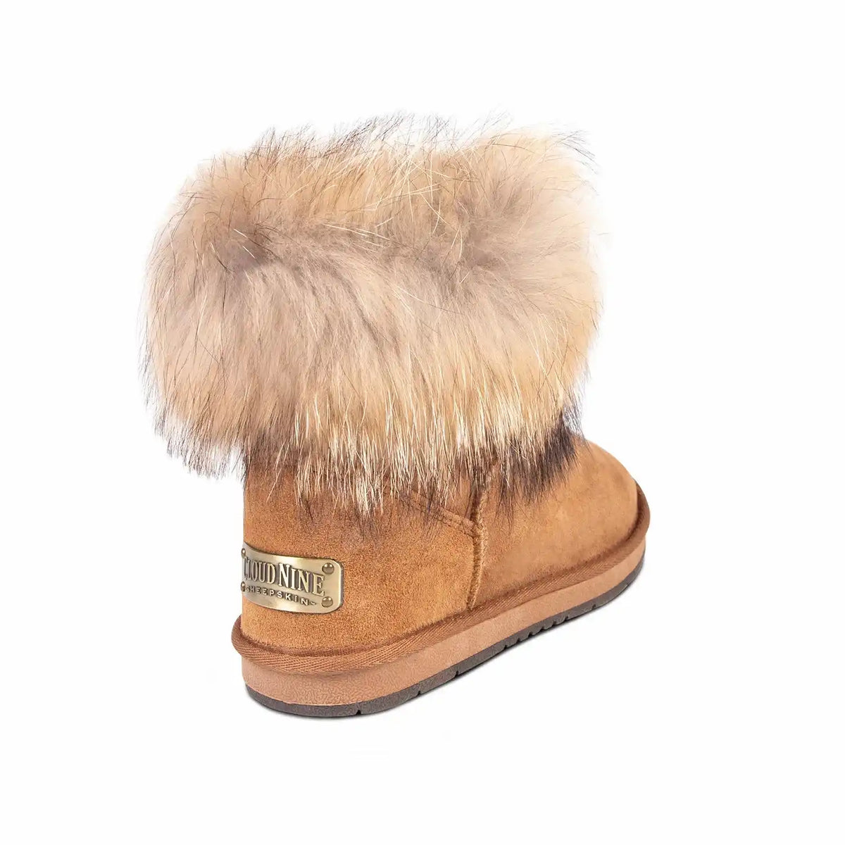 Brown suede boot with fur trim on a white background