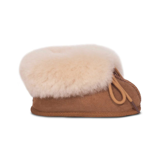 Chestnut sheepskin baby bootie with fleece cuff, side view